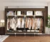 Portable closet organizer with 4 hanging areas and 4 storage zones in a small bedroom