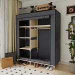 Goldoma freestanding fabric wardrobe with 6 storage areas, portable closet with shelves and hanging rail in a bedroom