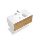Side angle of the wall-mounted vanity cabinet with two soft-close doors, in a bright bathroom.