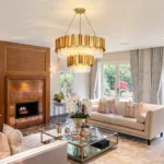 Elegant gold crystal chandelier with 17 lights illuminating a modern dining room