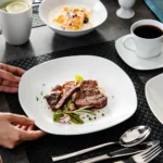 Elegant 50-piece porcelain tableware set by MALACASA Elisa series on a dining table