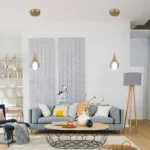 Brass globe pendant light illuminating a modern kitchen island