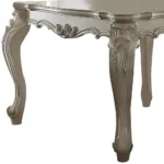 55-inch antiqued white solid wood dining table seating six in a modern dining room