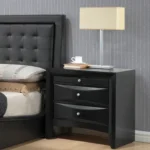 Black nightstand with two drawers and pull-out tray in modern bedroom setting - Goldoma furniture