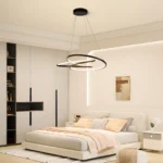 View of the chandelier from below, highlighting its minimalist design and the warm glow of the LEDs against a white