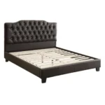 Modern faux leather queen bed with tufted upholstered headboard in a stylish bedroom setting