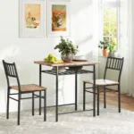 Rustic brown dining table set with two chairs and a storage shelf underneath in a modern industrial style