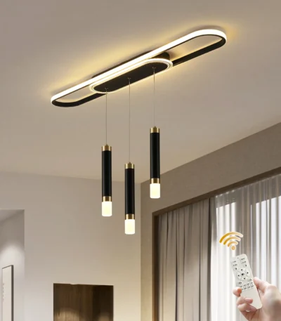 62W modern dimmable LED chandelier in black with three acrylic pendant lights over a kitchen island.