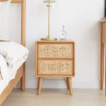 Solid oak bedside cabinet with rattan drawers in modern Nordic style