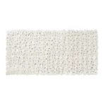 Beige non slip bath mat with pebble texture in bathroom