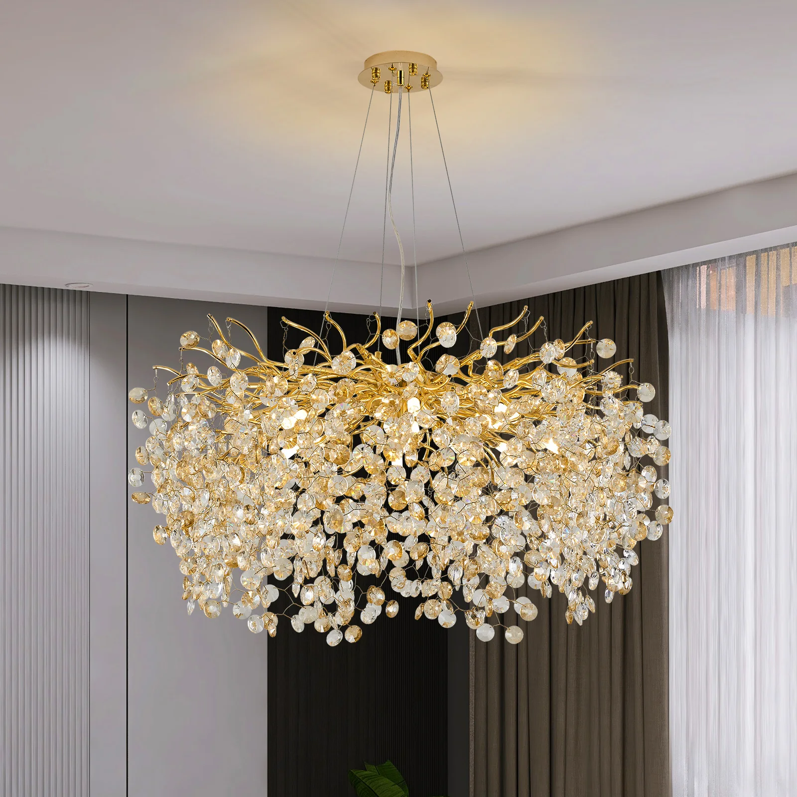 Modern crystal chandelier tree branch design illuminating a dining room