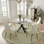 Goldoma luxury rotating dining table with sintered stone marble top and metal legs in a modern dining room