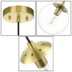 Side view of brass ceiling pendant light with glass shade, against a dark background.