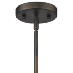 HMS hanging light installed in a villa entrance, its bronze finish complementing the warm white light and marble