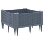 Blue grey polypropylene medium garden planter with flowers on patio