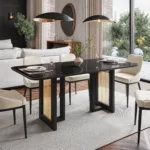 Modern 6-seater dining table with black MDF frame, gold legs, and tempered glass top in a contemporary dining room setting