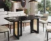 Modern glass top dining table with black and gold metal base, rectangular shape, set for six