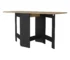 Space saving dining table with drop leaf extended, wood brown top and black trestle base in a cozy dining room