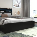 Goldoma full size bed frame with storage drawers, LED lights, and charging station in a modern bedroom