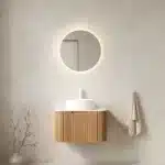 24-inch floating bathroom vanity with curved striped edges, white round ceramic basin, and natural woodgrain finish,