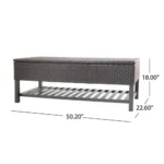 Goldoma Regent storage bench with metal rack featuring woven rattan top and black metal frame in entryway