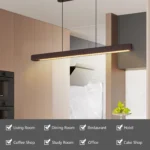 Goldoma chandelier adjusted to different heights, showcasing its flexible cord and sleek black fixture.
