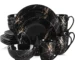 Porcelain dinnerware set with gold splash design on black plates, bowls, and cups