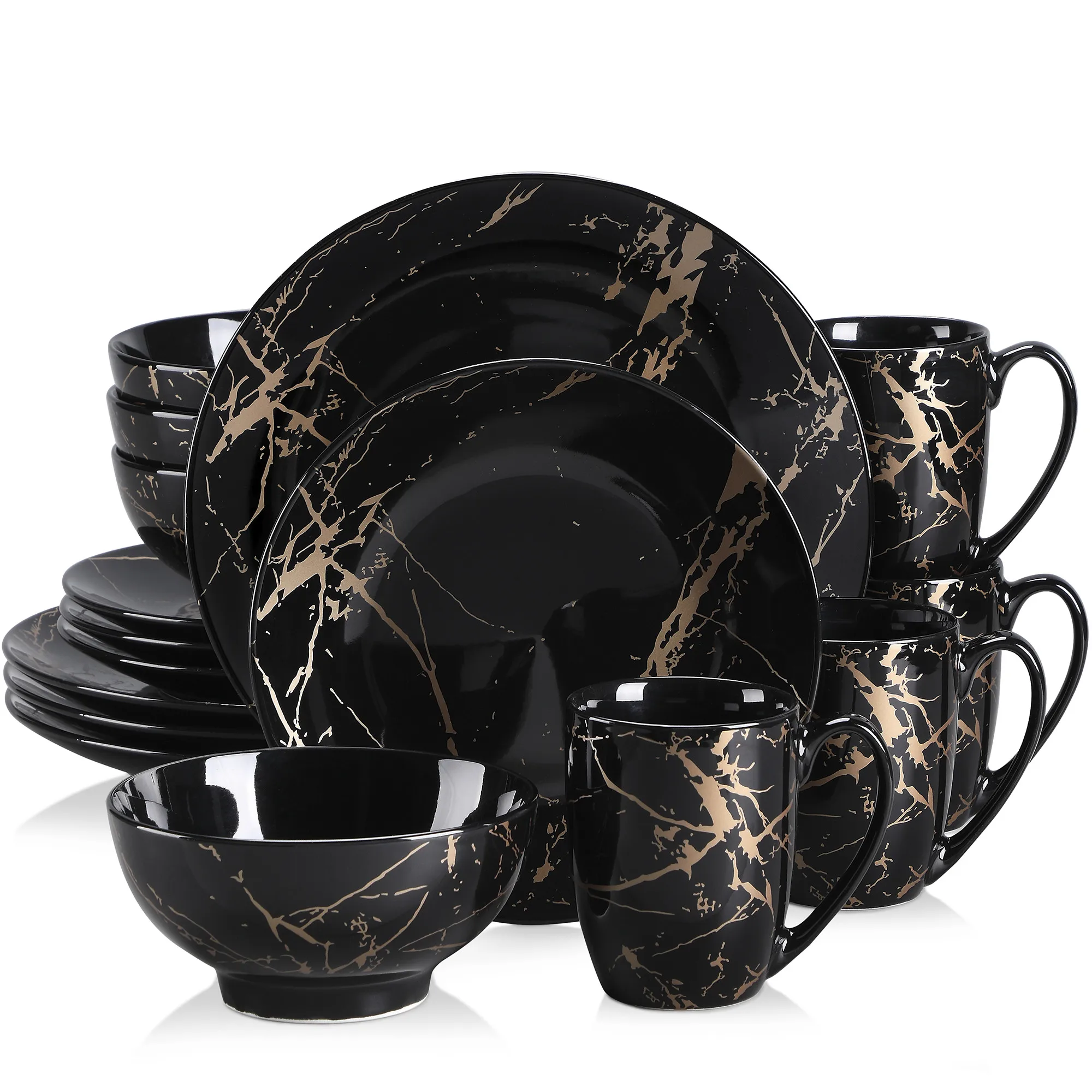 Porcelain dinnerware set with gold splash design on black plates, bowls, and cups