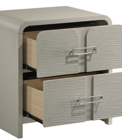 Modern 2-drawer nightstand beige with textured metal handles next to bed