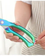 Goldoma heavy duty kitchen shears cutting through chicken bone on cutting board