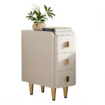 Beige leather narrow nightstand with drawers and stone top, perfect as a small bedside table