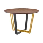 Round dining table for 4 with brown wood top and gold iron sled base in a cozy dining room