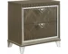 Dark champagne nightstand with geometric pattern and crystal legs in a modern bedroom