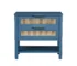 Boho bedside table with rattan nightstand featuring two drawers and a storage shelf in a cozy bedroom