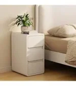 Modern solid walnut nightstand with two drawers in a bedroom setting