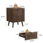 Modern double drawer nightstand with solid wood legs in walnut finish against a bedroom wall