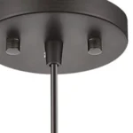 HMS modern pendant light installed in a cozy living room corner, bronze metal and frosted glass complementing wooden