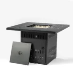Propane fire pit table with blue flame on patio surrounded by chairs