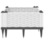 Modular white polypropylene planter pot set displayed on a patio with outdoor furniture in background.