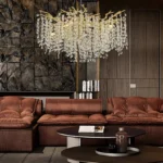 Modern crystal chandelier with K9 crystals illuminating a dining room