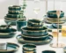 Luxury dinnerware set green porcelain with gold inlay on dining table