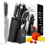 Damascus steel knife set with Pakka wood handles and wooden knife holder on a cutting board