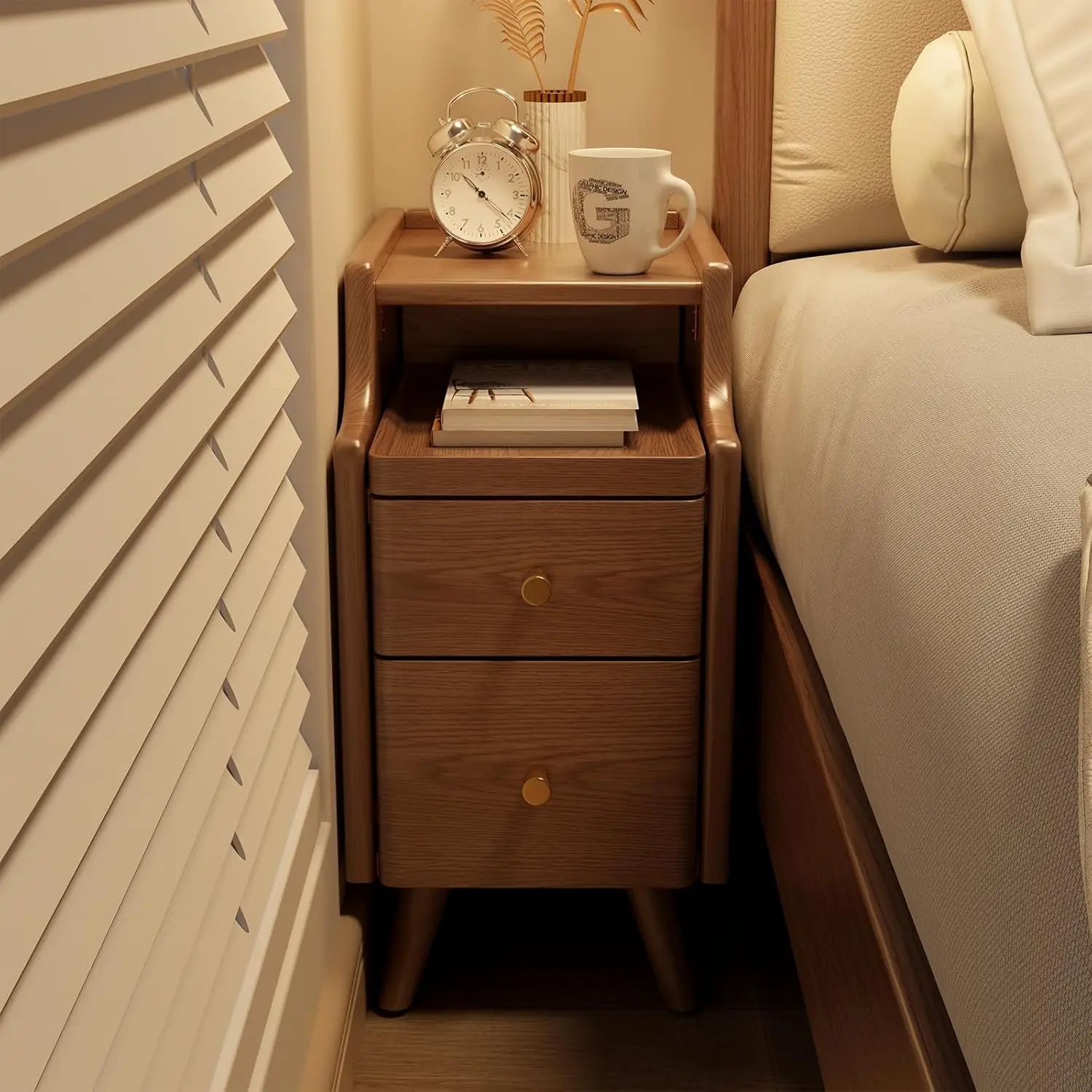 Modern solid walnut nightstand with two drawers in a bedroom setting