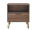 Brown nightstand with gold legs featuring a drawer and open shelf in a modern bedroom