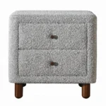 Gray boucle nightstand with two drawers and wooden legs in a modern bedroom setting