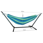 Two person hammock with stand in blue and green stripes on a sunny patio