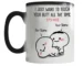 Funny color changing mug with heat sensitive design revealing hidden text when hot