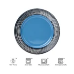 Elegant ceramic dinner plates set on a wooden table, showcasing durable white porcelain dinnerware