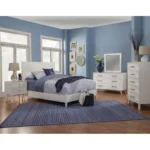 White carved solid wood California king bed frame with geometric design from Goldoma