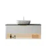 Floating bathroom vanity with sensor light illuminated, revealing the open shelf and storage space beneath the sink